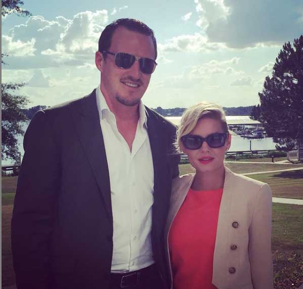 Dion Phaneuf with his wife Elisha Cuthbert.